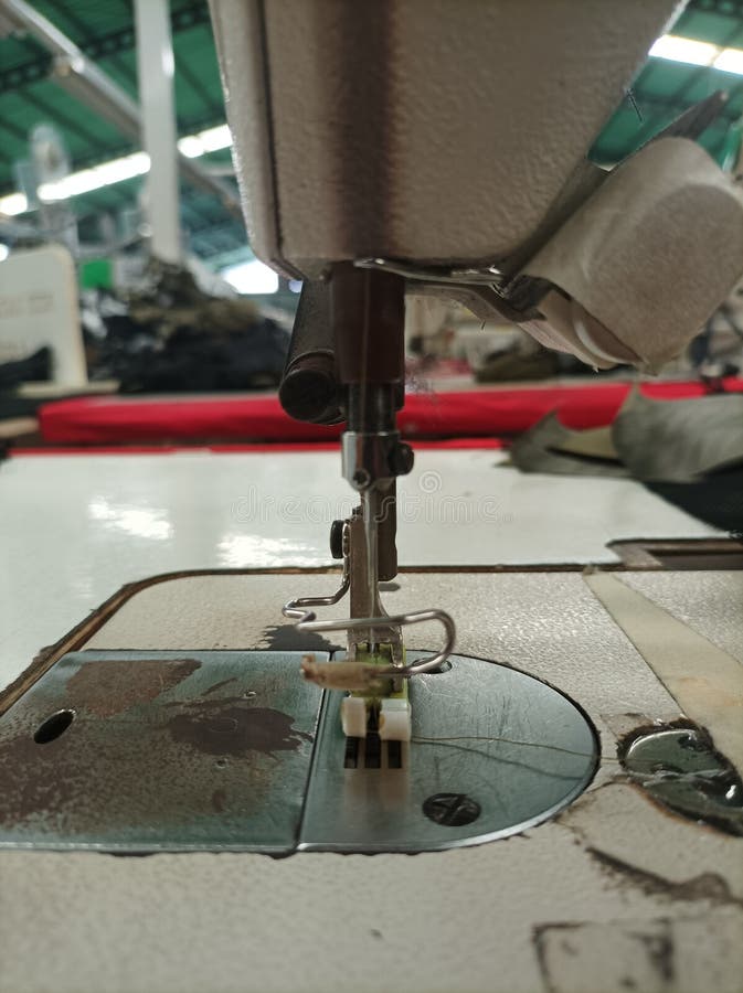 This is a Single Needle Sewing Machine Equipped with a Needle Guard