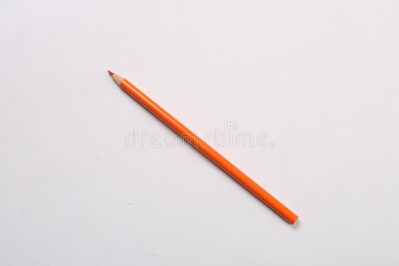 Single orange color pencil stock photo. Image of pencil 98547766