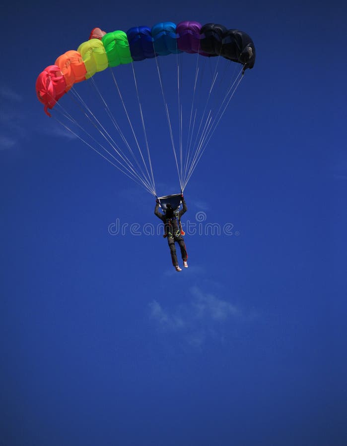 Single Parachute Jumper Against Blue Sky Background Stock Photo Image