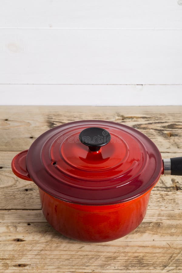 Single Red Saucepan with Lid Stock Photo Image of metal, kitchenware