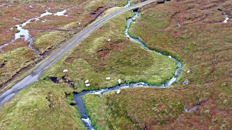 Single track at Loch Cuithir and Sgurr a Mhadaidh Ruadh - Hill of the Red Fox, Isle of Skye, Scotland