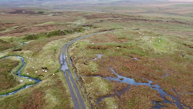 Single track at Loch Cuithir and Sgurr a Mhadaidh Ruadh - Hill of the Red Fox, Isle of Skye, Scotland