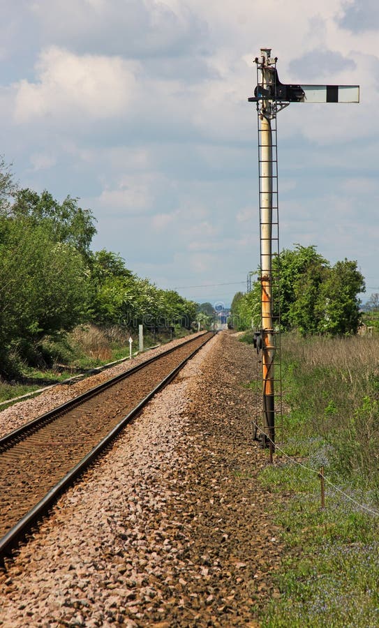 A Single Track Railway Line With Semaphore Signal Stock Photo Image
