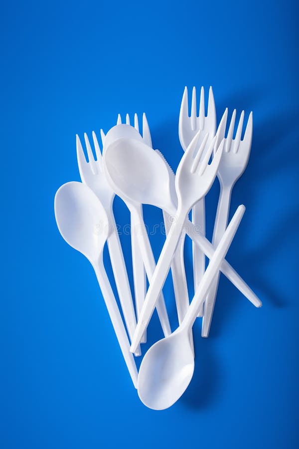 Single Use Plastic Forks, Spoons. Concept of Recycling Plastic, Plastic