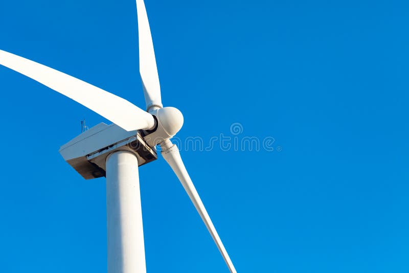 Single Wind Turbine Over Dramatic Blue Sky Stock Image Image of