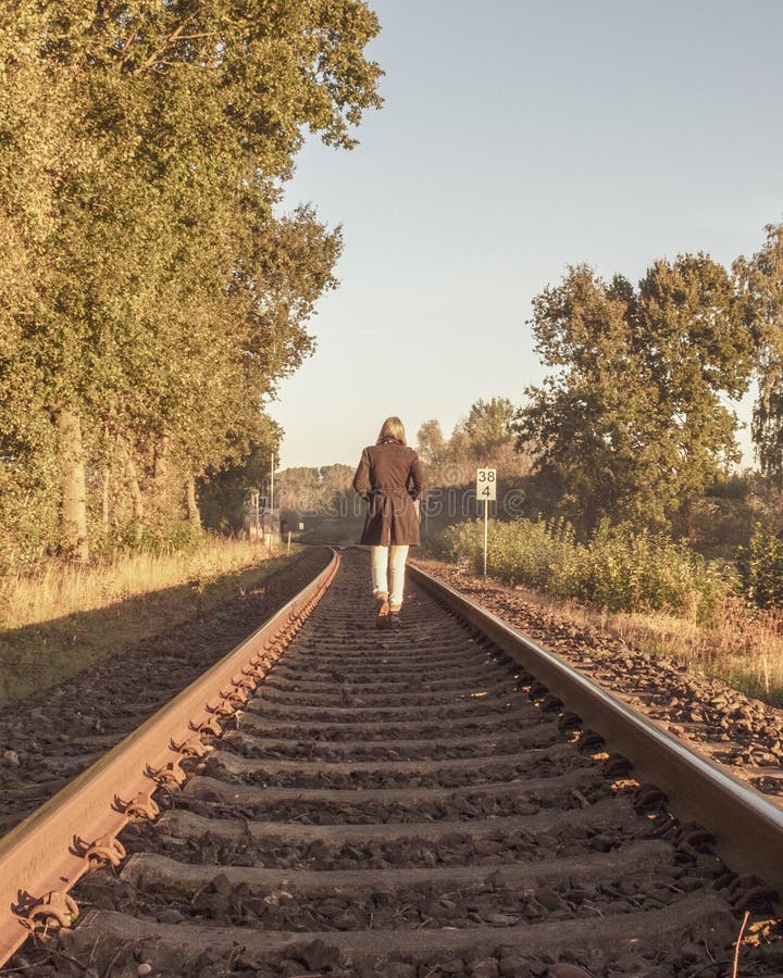 Single Woman is Running on Railway Tracks. Stock Image - Image of rail ...