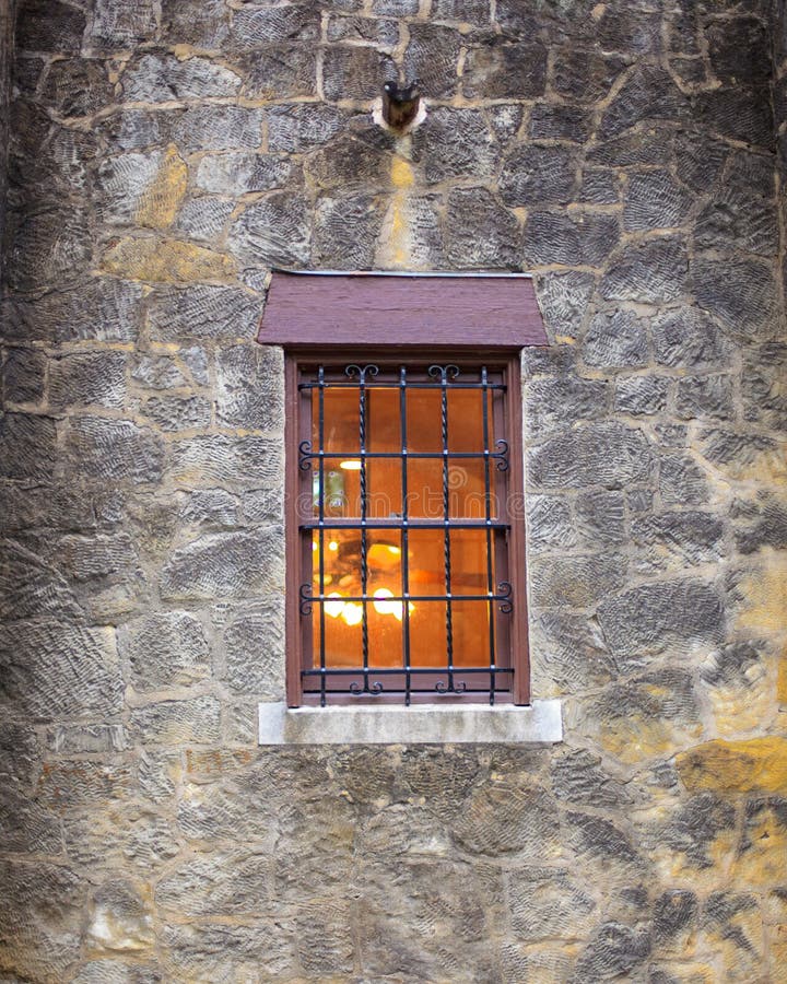 Single Wood Framed Window with Metal Bars royalty free stock image Single Wood Framed Window with Metal Bars royalty free stock image