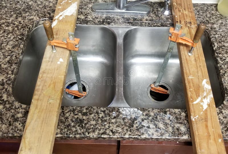 Sink Repair stock photo. Image of renovation, sink, repair 134157984