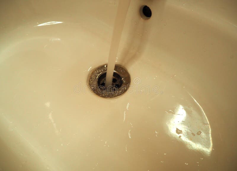 A sink with water flow stock image. Image of sink, wash 146038925