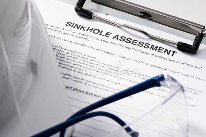 Sinkhole Assessment form on Clipboard royalty free stock photography Sinkhole Assessment form on Clipboard royalty free stock photography