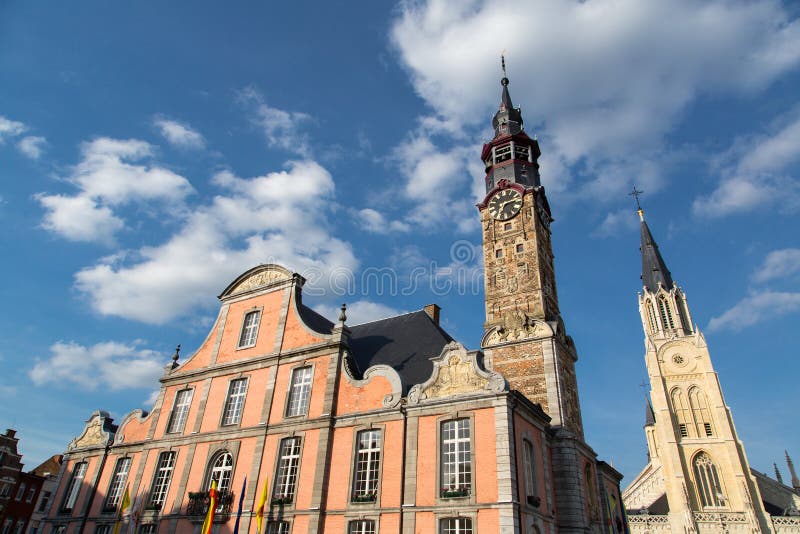 Sint - Truiden Town hall. The town hall in the historical centre of Sint-Truiden, Belgium, with a 17th-century tower classified by UNESCO as a World Heritage royalty free stock image Sint - Truiden Town hall. The town hall in the historical centre of Sint-Truiden, Belgium, with a 17th-century tower classified by UNESCO as a World Heritage royalty free stock image