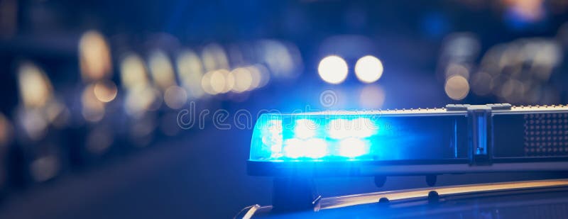 Siren light on roof of police car