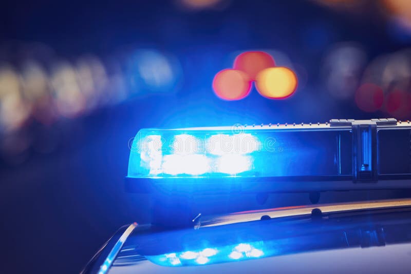 Siren light on roof of police car