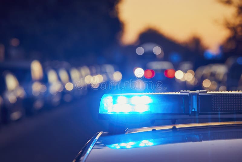 Siren light on roof of police car