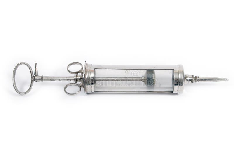 Old syringe of metal and crystal. Old syringe of metal and crystal