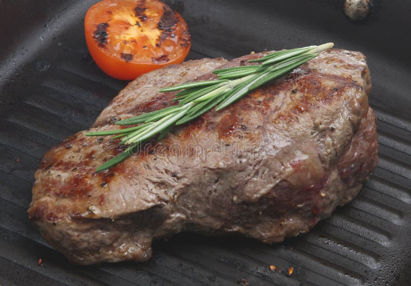 RibEye Steak Cooking on Griddle Stock Photo Image of grill, blood