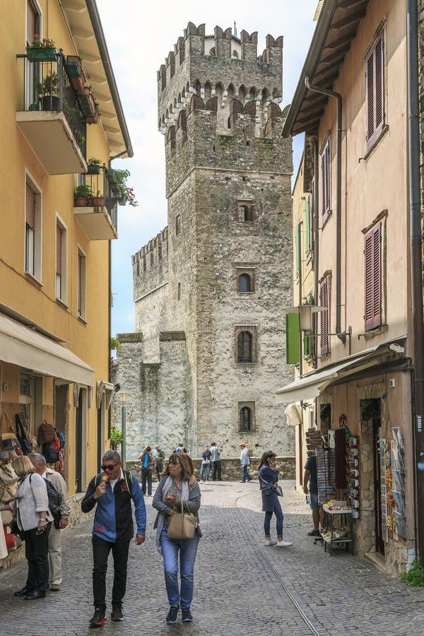 SIRMIONE, ITALY - MAY 13, 2018: It is about the bottom of the streets of the old city next to the Rocca Scaligera stock photos SIRMIONE, ITALY - MAY 13, 2018: It is about the bottom of the streets of the old city next to the Rocca Scaligera stock photos
