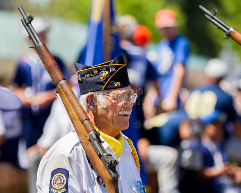 Middleton, Idaho July 4th 2012 - Pat Oatman from the Middleton Idaho Post 39 Honor Guard marching in the 4th of july parade. Middleton, Idaho July 4th 2012 - Pat Oatman from the Middleton Idaho Post 39 Honor Guard marching in the 4th of july parade.