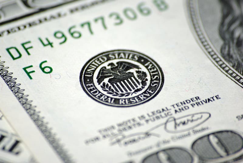 Sistema de reserva federal en billete de banco del dólar