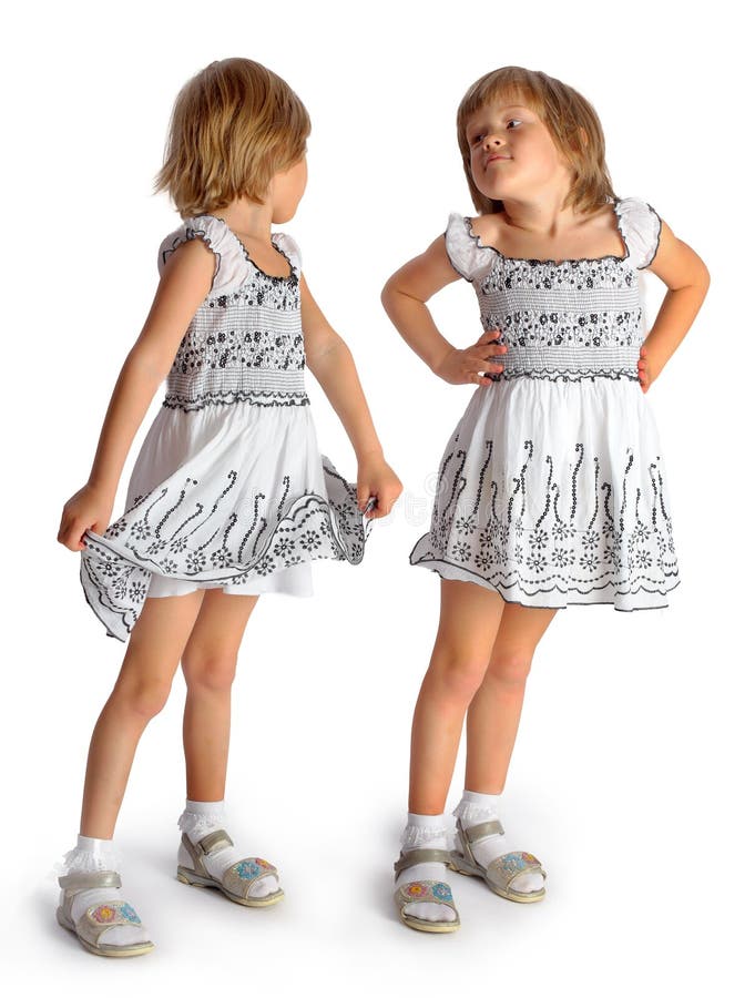 Charming Little Girl in Short Dress. Stock Photo - Image of
