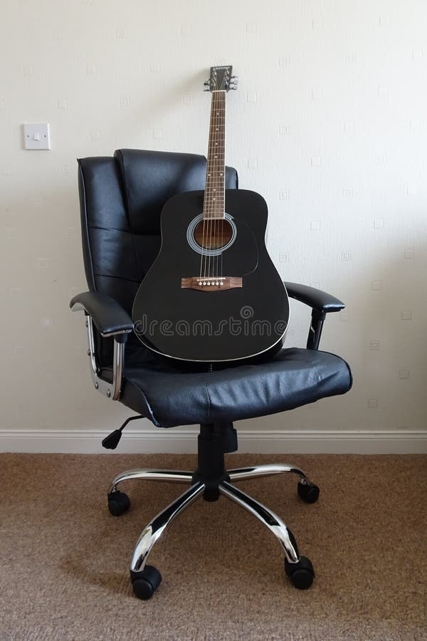 Acoustic Guitar on Leather Office Chair Stock Photo Image of audio