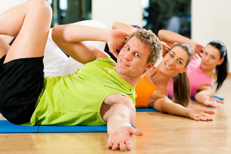 Sit-ups in gym for fitness