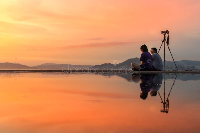 Public Cargo Ferry, Kennedy Town, Hong Kong: one of the few best places for taking sunset photos with reflection stock image Public Cargo Ferry, Kennedy Town, Hong Kong: one of the few best places for taking sunset photos with reflection stock image