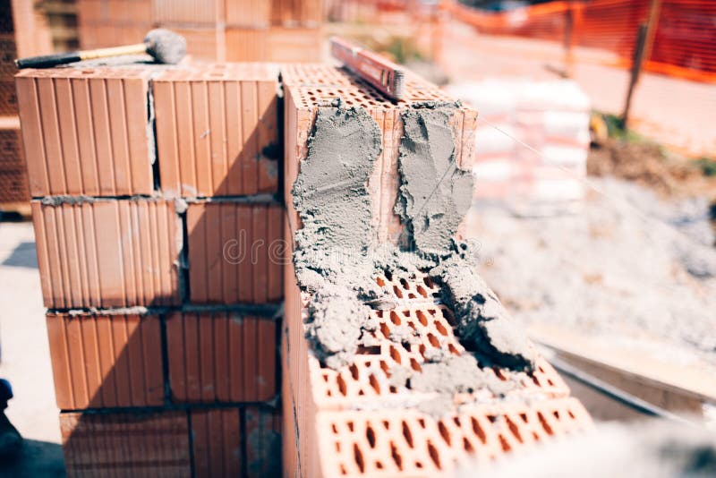 Sitio de la construcción de edificios Detalles de paredes de ladrillo y del cemento exteriores fotografía de archivo libre de regalías