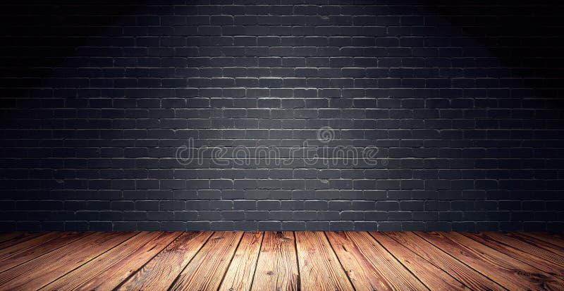 Sitio vacío con la pared de ladrillo negra y el piso de madera