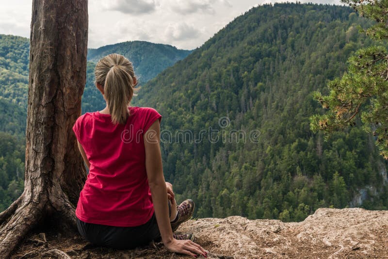 Sitting on a cliff