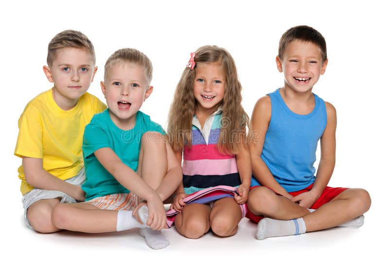 Sitting four cheerful children stock photo