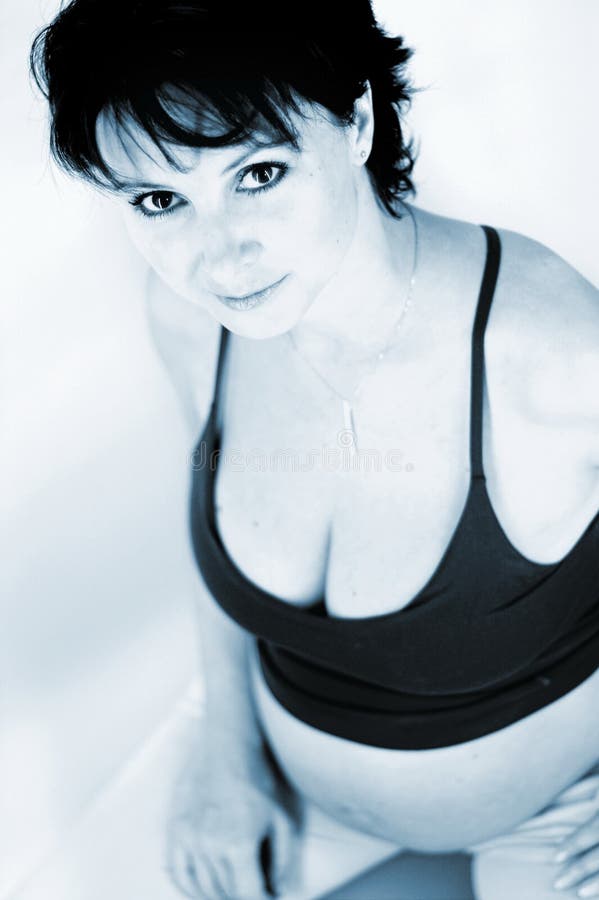 Sitting gravid mother stock photo