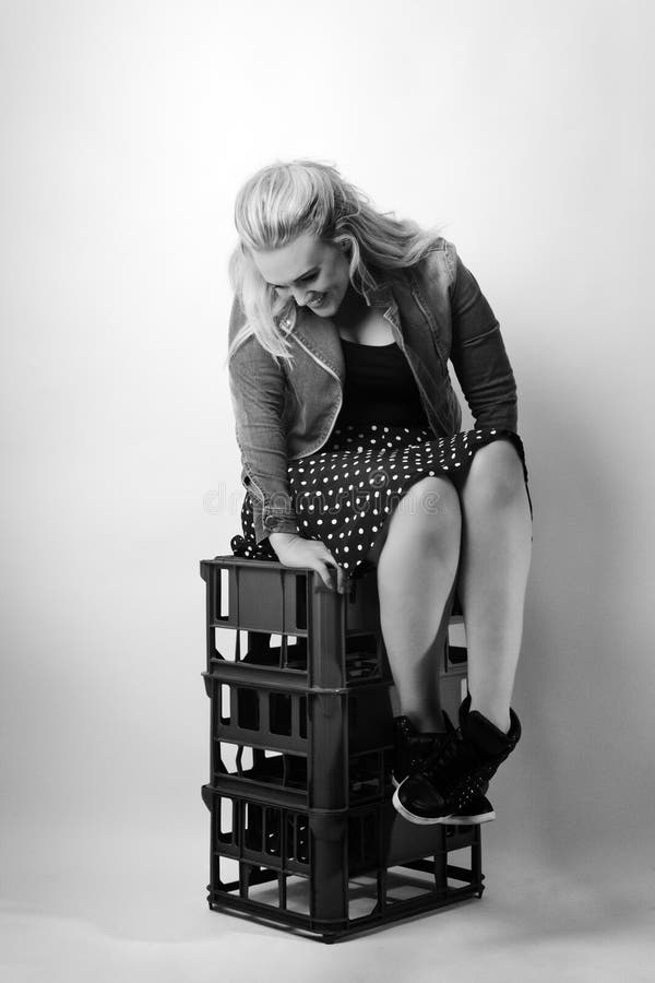 Sitting on milk crates stock image. Image of dress, fashion 33512305