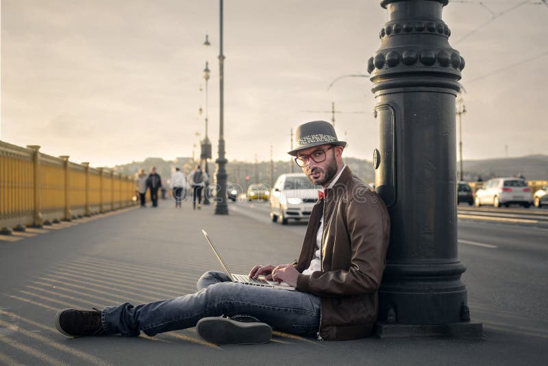 Sitting on the sidewalk