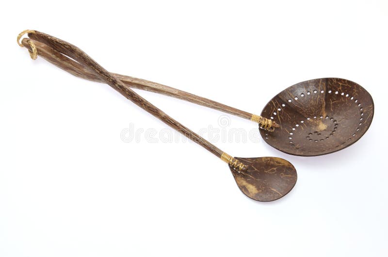 Pictured wooden ladles in a white background. Pictured wooden ladles in a white background.