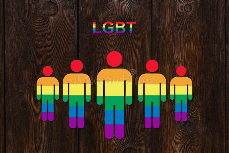 Six a coloré les hommes de papier sur le fond en bois Concept de fierté de LGBT illustration libre de droits Six a coloré les hommes de papier sur le fond en bois Concept de fierté de LGBT illustration libre de droits