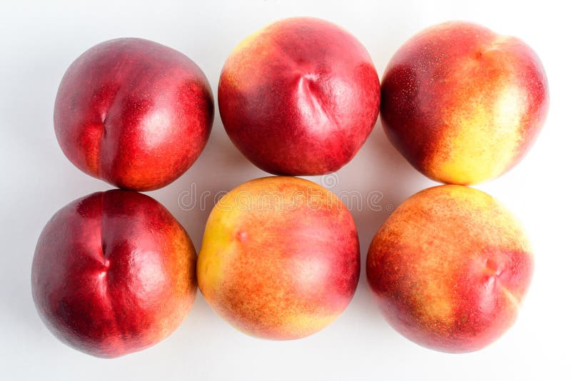 https://thumbs.dreamstime.com/b/six-fresh-ripe-nectarine-fruits-displated-as-two-lines-white-table-isolated-soft-focus-top-view-195443012.jpg