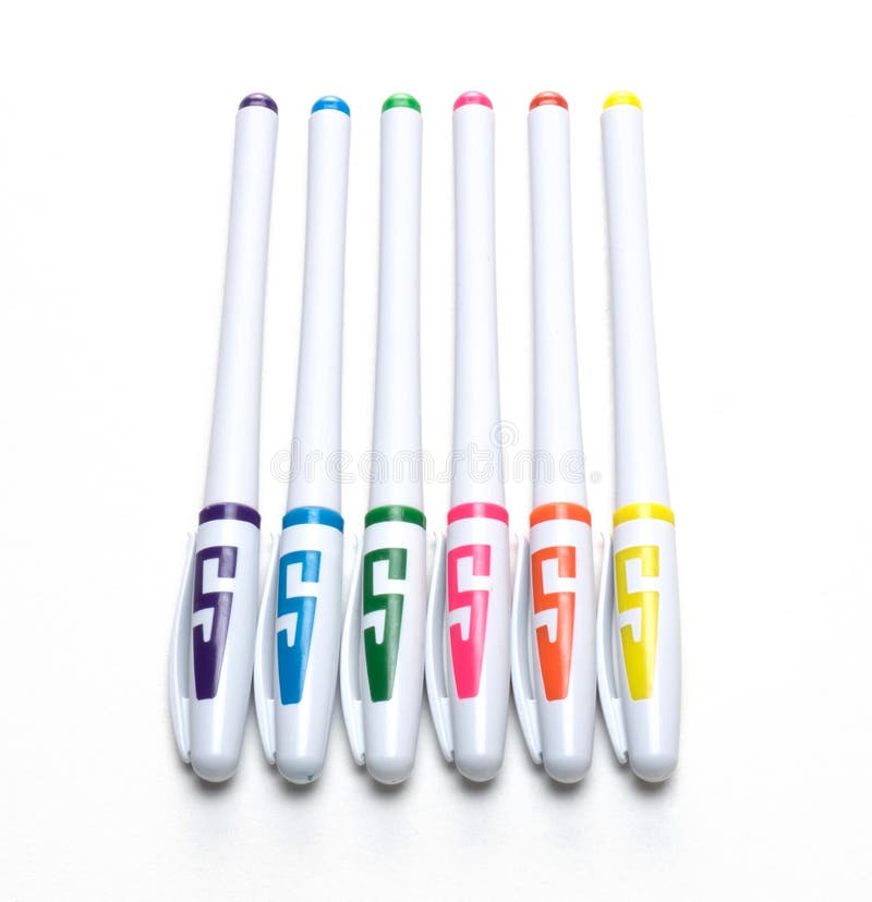 Six Multicolored Ball Point Pens on a White Stock Photo Image of