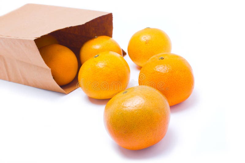 Six Oranges Falling From Paper Bag. Stock Photo Image of natural