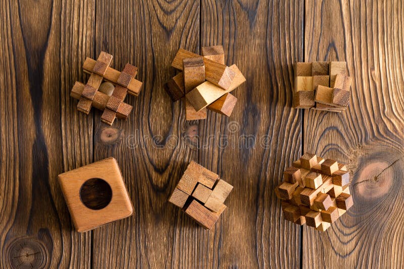 Six wooden puzzles of differing complexities