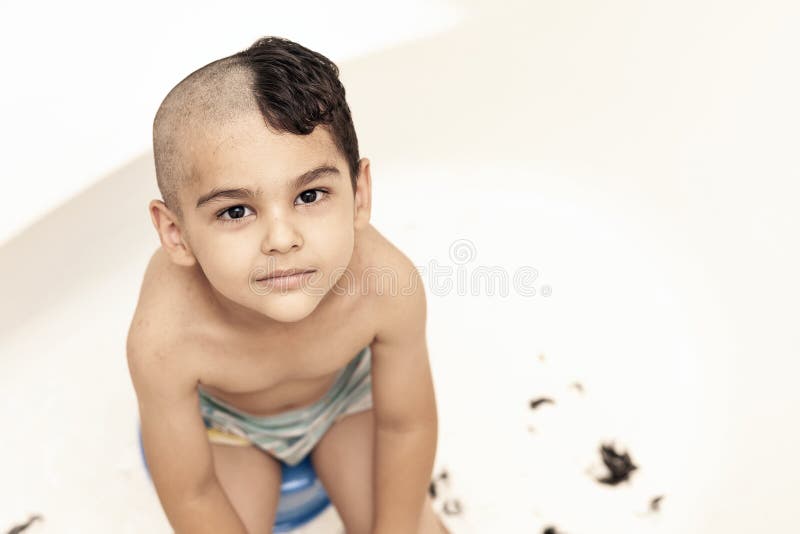 Six-year Boy at Hair Cutting at Home. Father Cut Half of the Son`s Hair Off  at the Bathroom Stock Photo - Image of lifestyle, hair: 154593160