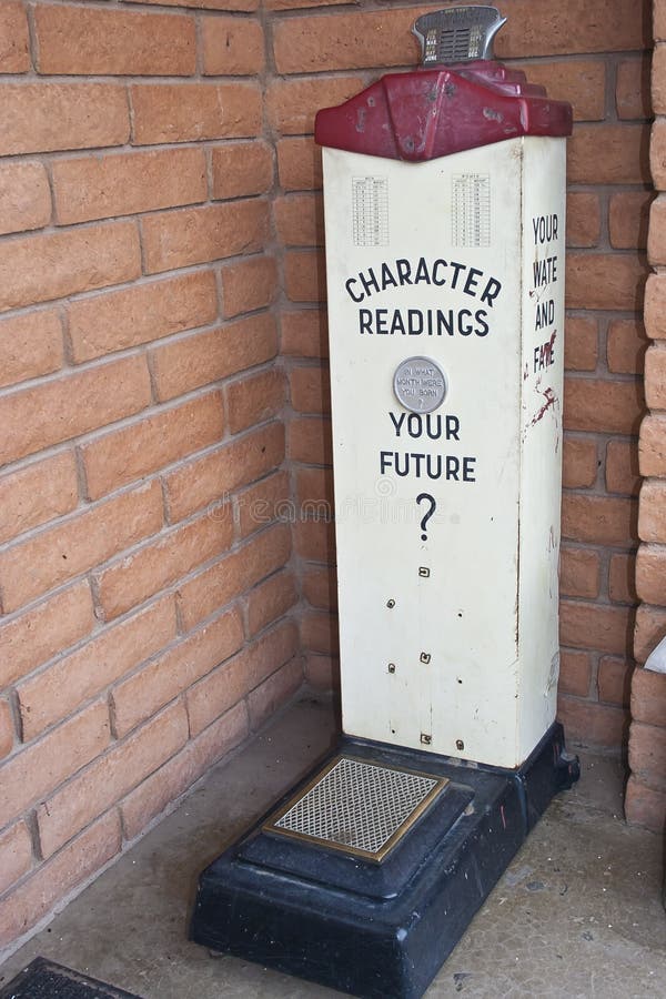 Old scale and fortune machine. Old scale and fortune machine.