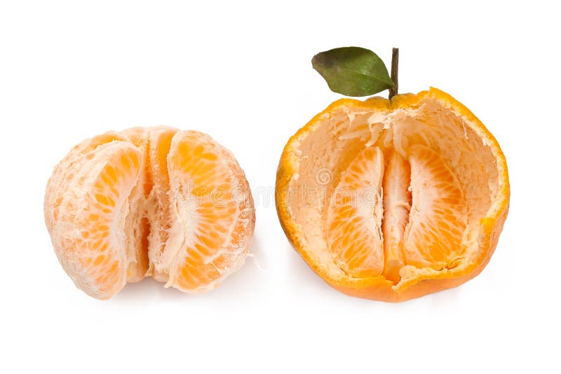 Skalad Tangerine och Tangerine arkivfoto Skalad Tangerine och Tangerine arkivfoto