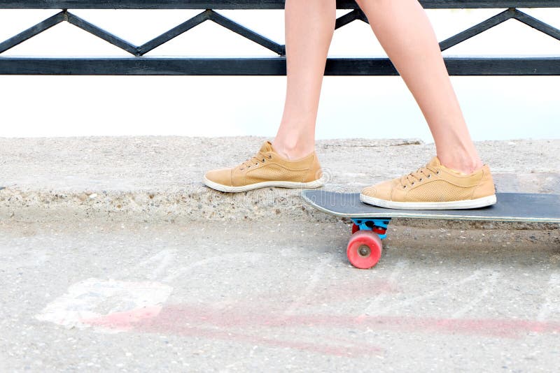 High heels on skateboard stock photo. Image of skate, street 123262