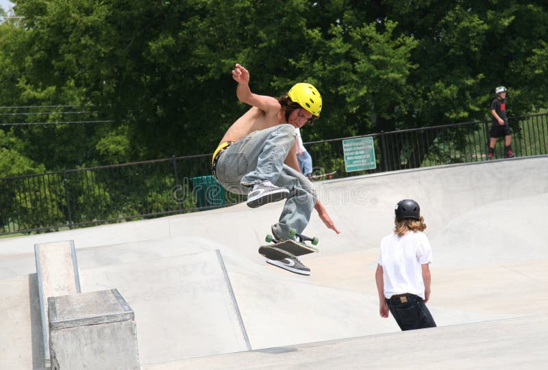 Skateboarder Flipping Board