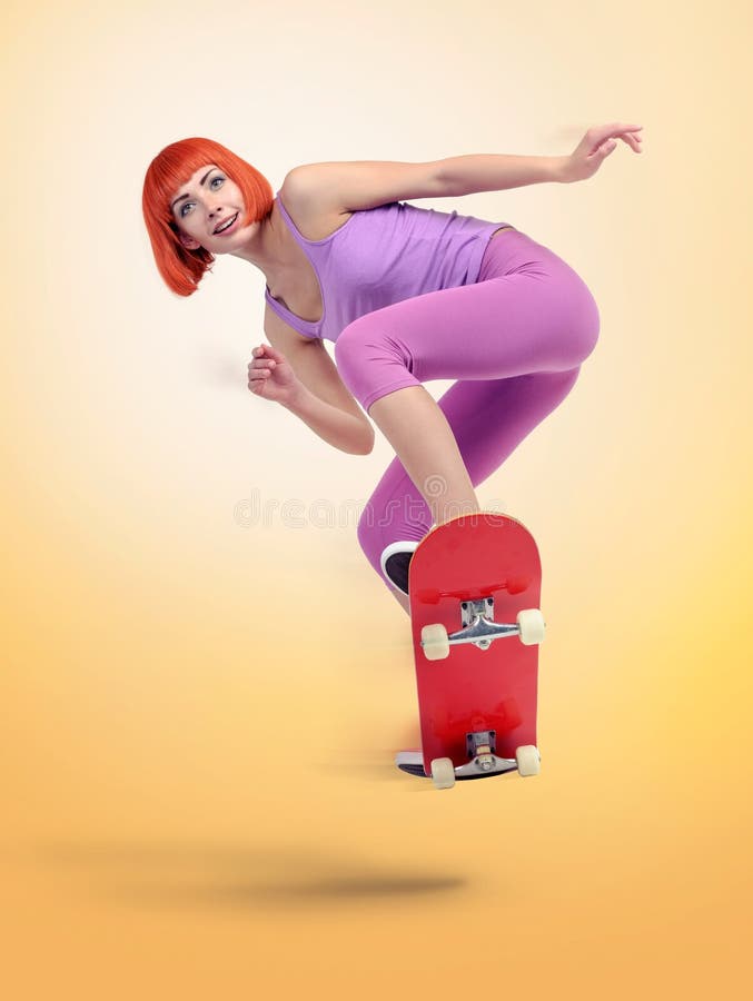 Skateboarder young woman jumping on yellow background