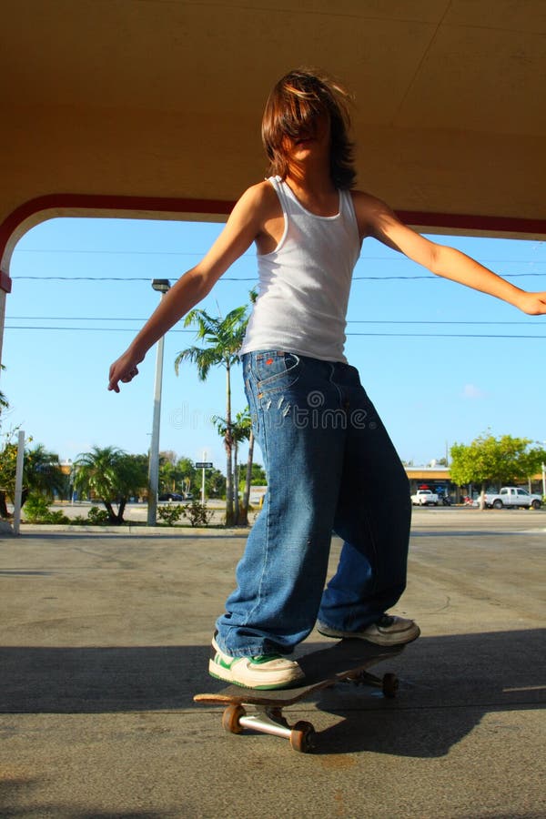 Young boy on a skateboarding. Young boy on a skateboarding.