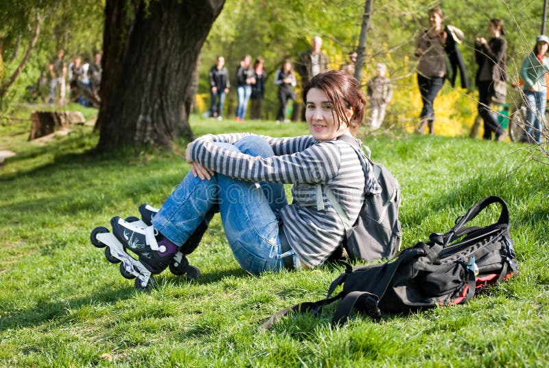 Skater girl resting in the park