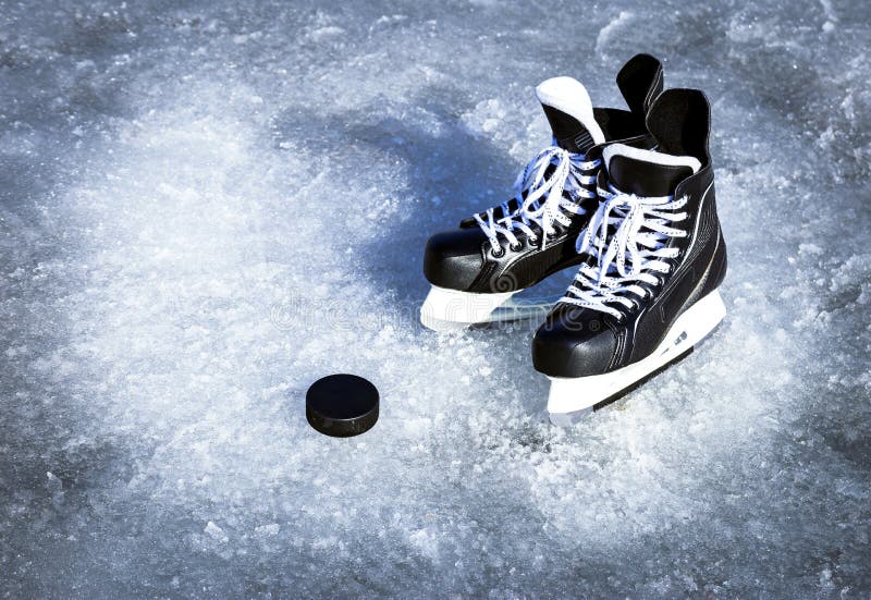 Skates for Winter Sports in the Open Air on the Ice. Stock Image Image of equipment, puck