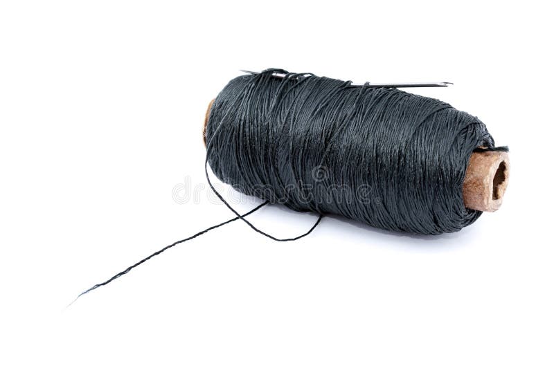 Black Thread With A Needle On An Ancient Antique Old Wooden Coil